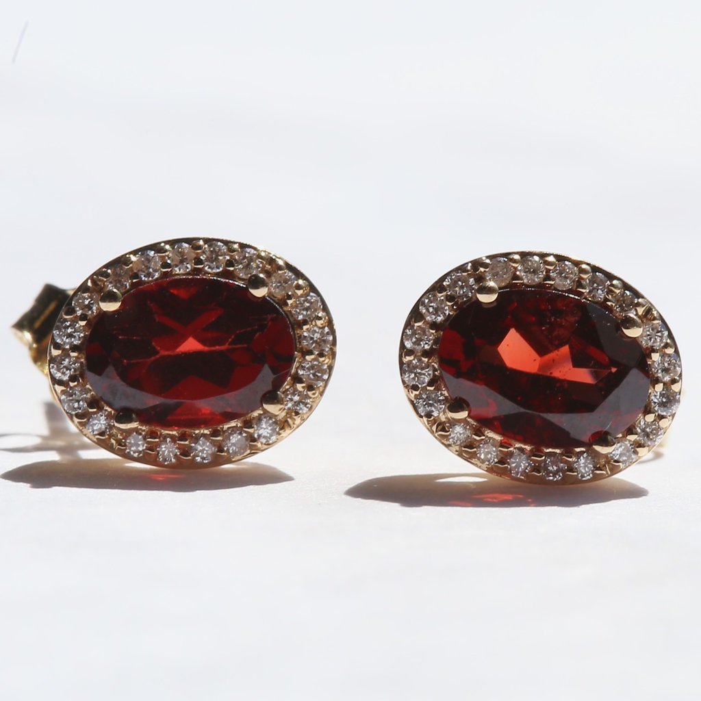 American Jewelry 14k Yellow Gold 1/5ctw Round Brilliant Diamond Oval Garnet Halo Stud Earrings