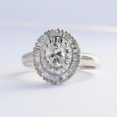 American Jewelry ESTATE Platinum 1.00ctw (1/2CT H/SI1 Ctr) Oval Double Baguette Diamond Halo Ring (Size 5.5)
