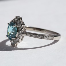 American Jewelry 14k White Gold .27ctw Round Brilliant Diamond Blue Zircon Halo Fashion Ring (Size 7)