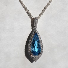 American Jewelry 14k White Gold 1/4ctw Round Brilliant Diamond & Blue Topaz Pear Halo Necklace