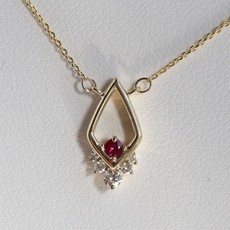 American Jewelry 14k Yellow Gold .06ctw Round Brilliant Diamond & Ruby Petite Openwork Necklace