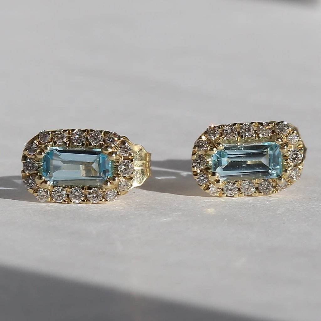 American Jewelry 14ky .11ct Dia .50ct Blue Topaz Halo Earrings