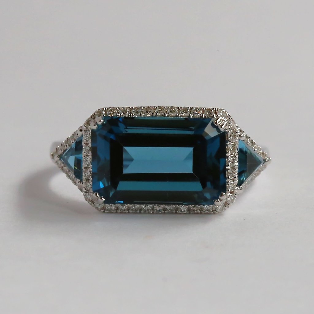 American Jewelry 14k White Gold 5.27ct Emerald & Trillion Cut London Blue Sapphire & .22ctw Diamond Halo Ring (Size 6.5)