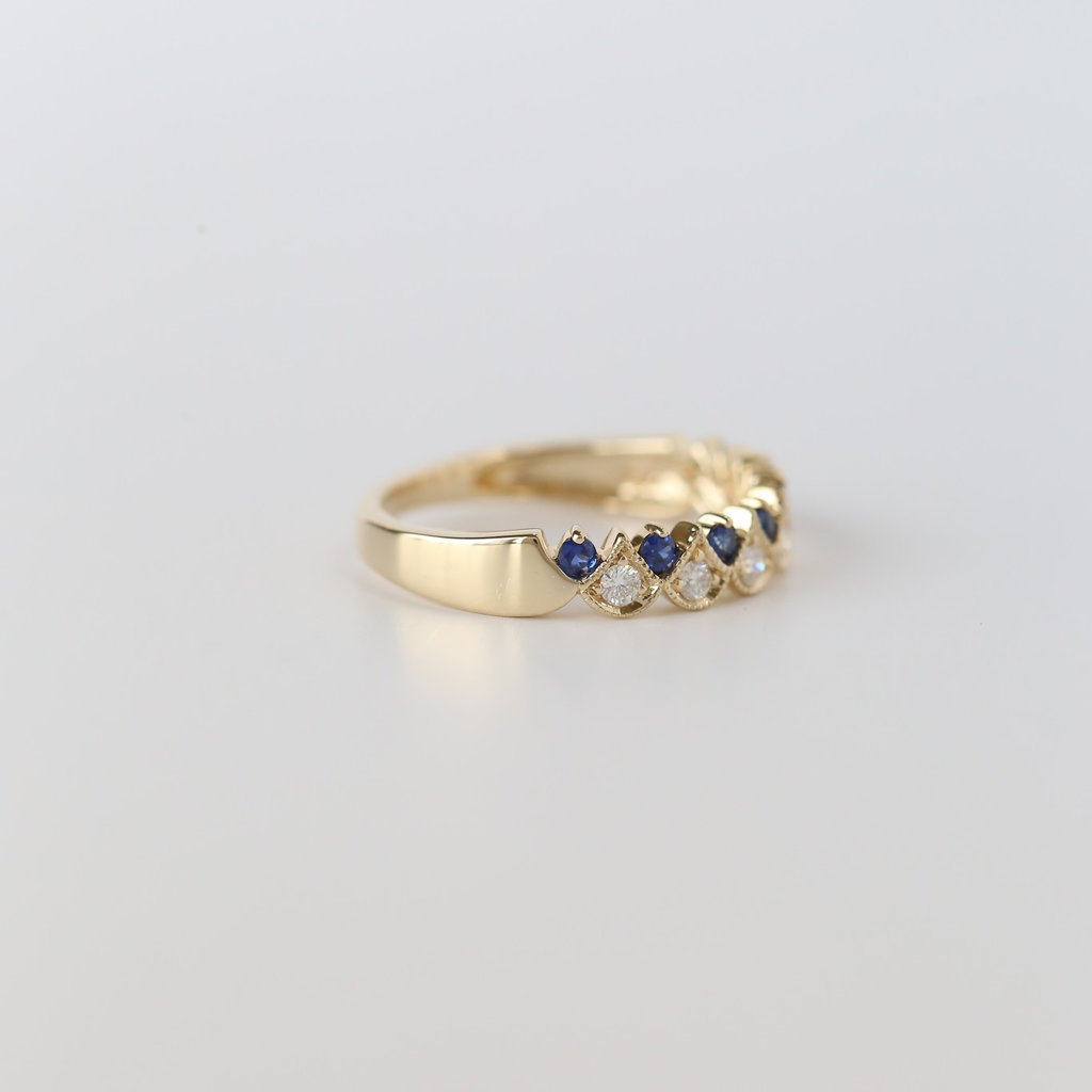 14k Yellow Gold .16ctw Diamonds and .25ctw Blue Sapphire Milgrain Band