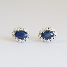 American Jewelry 10k White Gold 1.24ct Sapphire .07ct Diamond Oval Halo Stud Earrings
