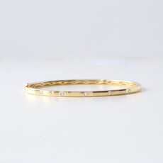 American Jewelry 14k Yellow Gold 0.22ctw Round Diamond Gypsy-Set Bangle Bracelet