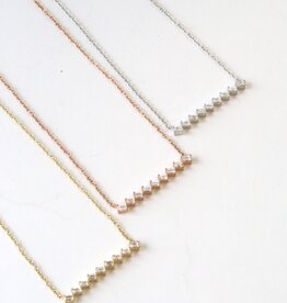 14k Gold .19ct Diamond Baguette Tilted Bar Necklace