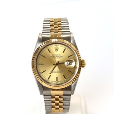 Rolex Rolex Datejust Oyster Perpetual with Champagne Dial 36mm
