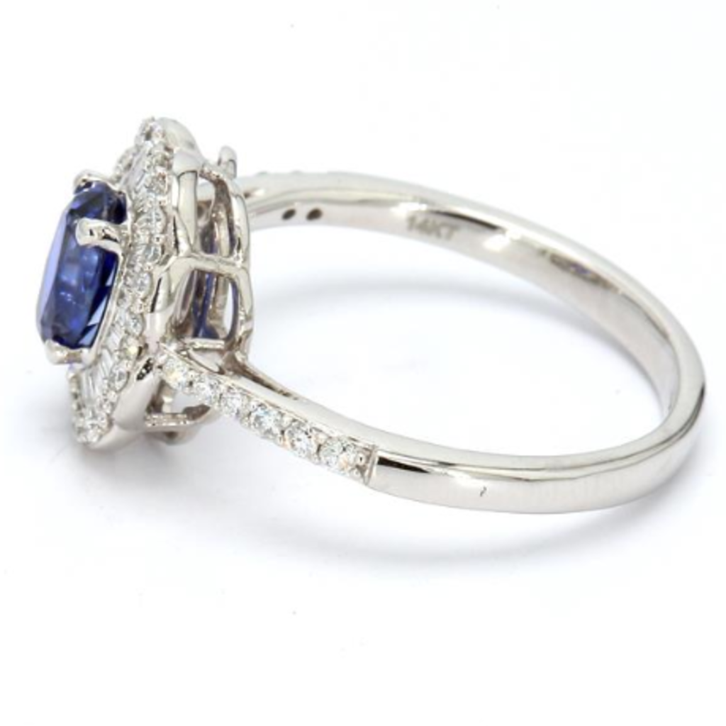 American Jewelry 14k White Gold 1ct Oval Blue Sapphire & .50ctw Round & Baguette Diamond Halo Ring (Size 7)