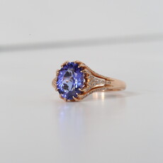 American Jewelry 14k Rose Gold .32ctw Diamond 2.29ct Oval Tanzanite Claw Prong Accented Ring (Size 6.5)