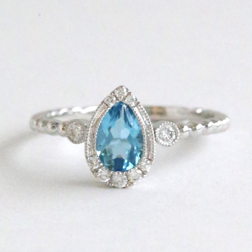 American Jewelry 14k White Gold .69ctw Blue Topaz .13ctw Diamond Half Halo Ring