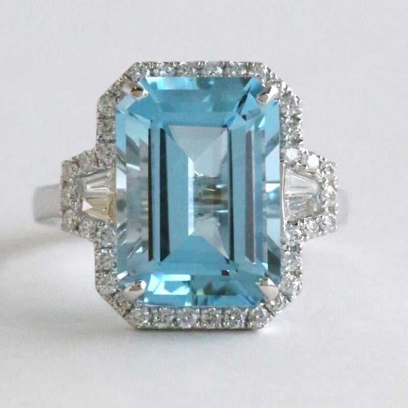 American Jewelry 14k White Gold 8.31ct Blue Topaz .47ctw Diamond Halo Ring