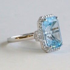 American Jewelry 14k White Gold 8.31ct Blue Topaz .47ctw Diamond Halo Ring