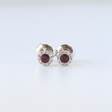 American Jewelry 14k White Gold .28ctw Ruby .07ctw Diamond Halo Petite Stud Earrings