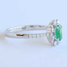 American Jewelry 14k White Gold .40ctw Emerald .32ctw Diamond Oval Halo Ring (Size 7)