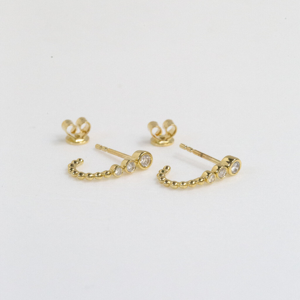 American Jewelry 14k Yellow Gold 0.26ctw Tapered Bezel J-Huggie Hoop Earrings