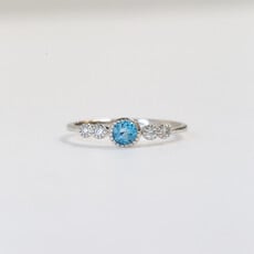 American Jewelry 14k White Gold 0.10ctw Diamond 0.30ct Blue Topaz Bezel Set Ring (Size 7)