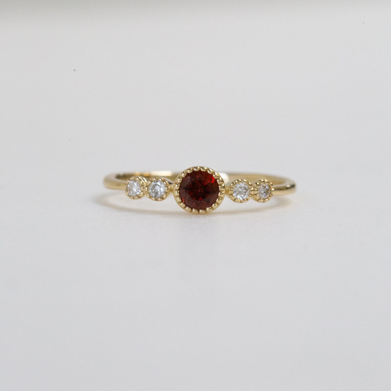American Jewelry 14k Yellow Gold 0.10ctw Diamond 0.34ctw Garnet Bezel Set Ring (Size 7)