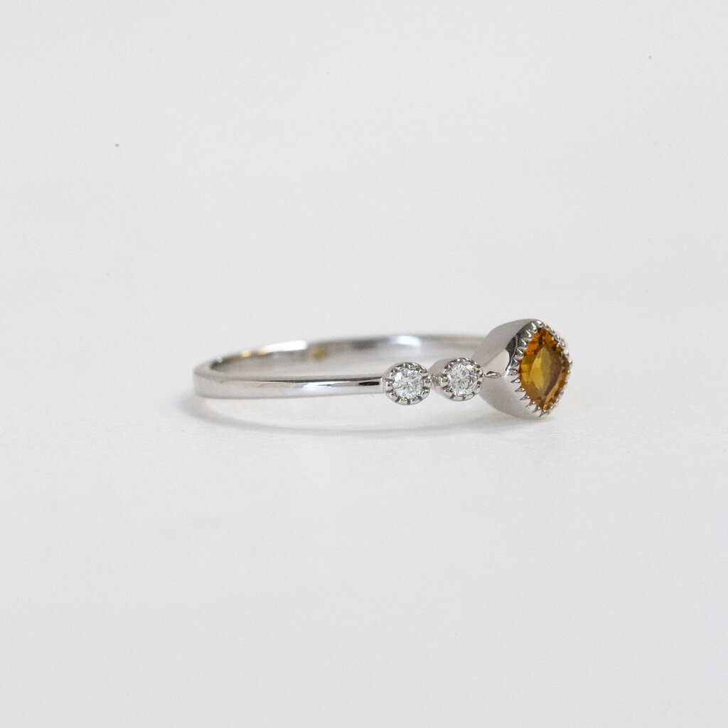 American Jewelry 14k Yellow Gold 0.12ctw Diamond 0.25ct Bezel Set Citrine Ring (Size 7)