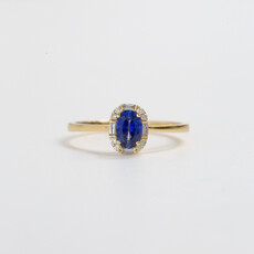 American Jewelry 14k Yellow Gold 0.10ctw Diamond Halo 0.60ct Oval Blue Sapphire Ring (Size 7)