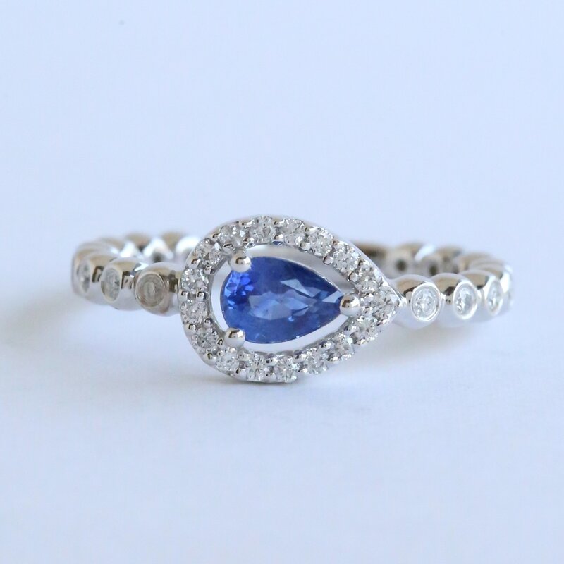 American Jewelry 14k White Gold .31ctw Diamond & Tanzanite East to West Pear Halo Bezel Beaded Ring