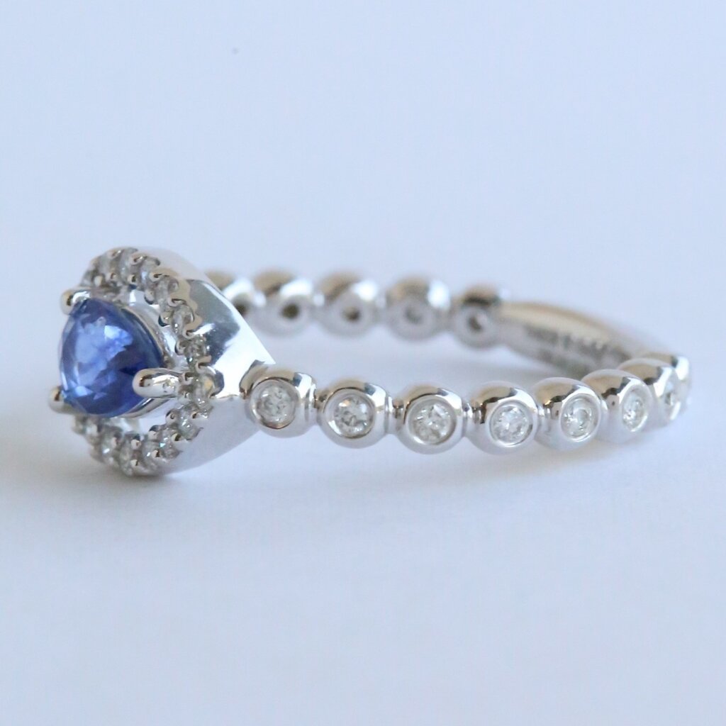 American Jewelry 14k White Gold .31ctw Diamond & Tanzanite East to West Pear Halo Bezel Beaded Ring