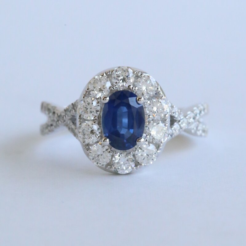 American Jewelry 18k White Gold .31ctw Diamond .78ct Sapphire Halo Infinity Band Ring