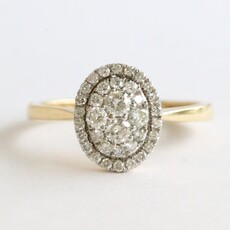 American Jewelry 14k Yellow Gold .51ctw Diamond Oval Pave Cluster Ring (Size 7)