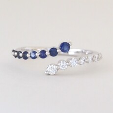American Jewelry 14k White Gold .29ctw Sapphire .27ctw Diamond Bypass Ring