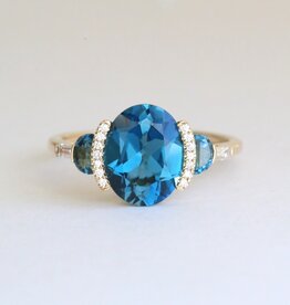American Jewelry 14k Yellow Gold 3.37ctw London Blue Topaz .11ctw Diamond Three Stone Ring
