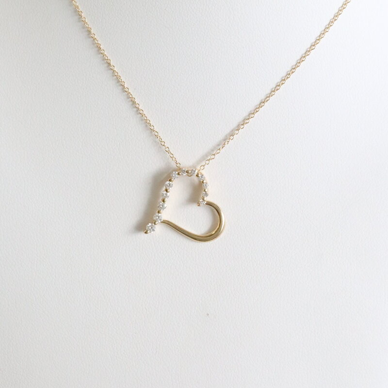 American Jewelry 14k yellow Gld .25ctw Diamond Sideways Hanging Heart Necklace