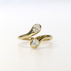 American Jewelry 14k Yellow Gold .41ctw Oval Diamond Bypass Ring (Size 7.5)