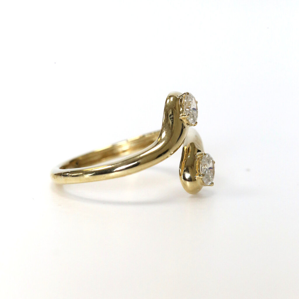 American Jewelry 14k Yellow Gold .41ctw Oval Diamond Bypass Ring (Size 7.5)