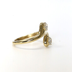 American Jewelry 14k Yellow Gold .41ctw Oval Diamond Bypass Ring (Size 7.5)