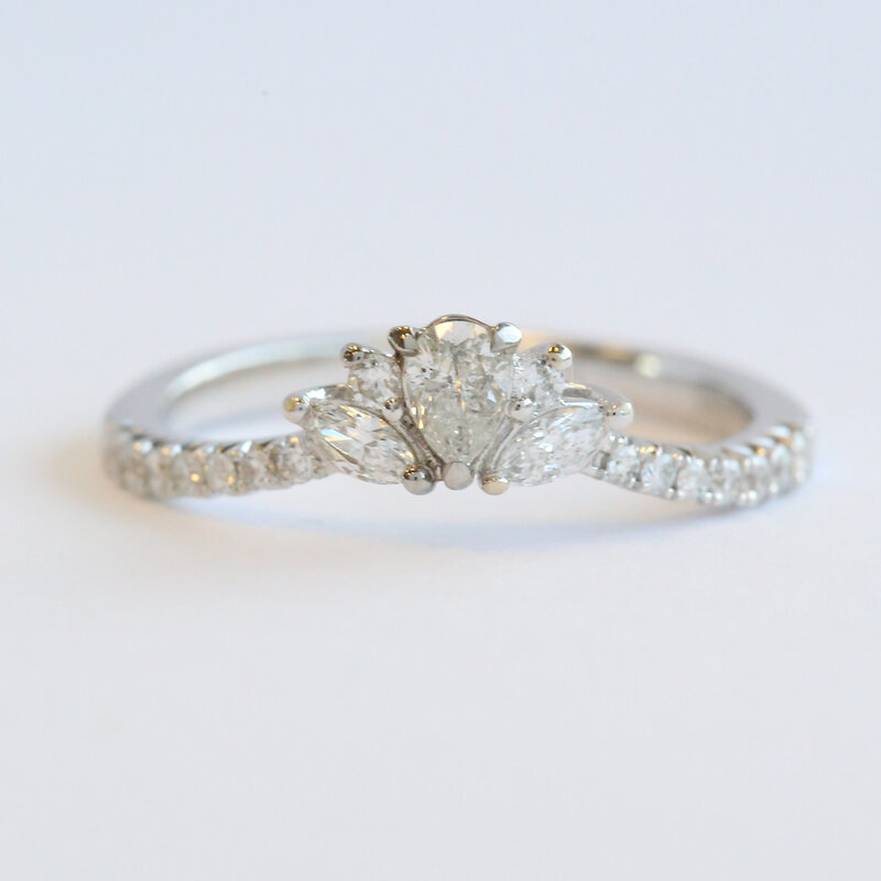 American Jewelry 14k White Gold .53ctw Diamond Pear Point, Marquise, and Round Contour Curved Wedding Band Ring (Size 7)