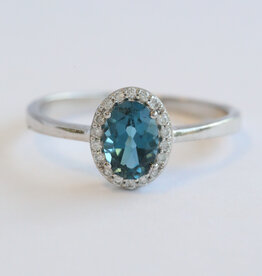 American Jewelry 14k White Gold .90ct Blue Topaz .12ctw Diamond Oval Halo Ring  (Size 7)