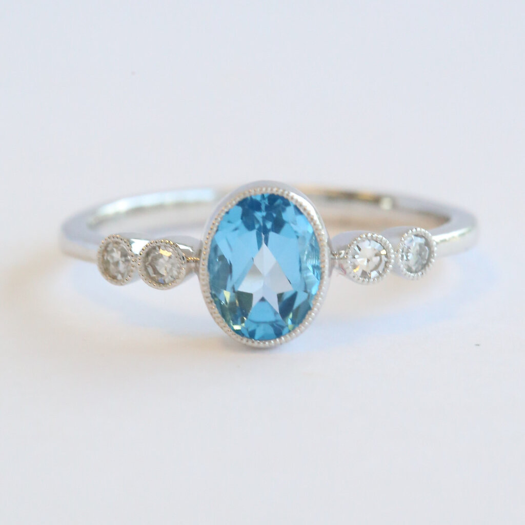 American Jewelry 14k White Gold .12ctw Diamond .75ct Blue Topaz Oval Milgrain Ring