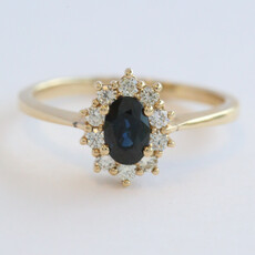 American Jewelry 14k Yellow Gold .28ctw Diamond .56ct Sapphire Oval Halo ring (Size 7)