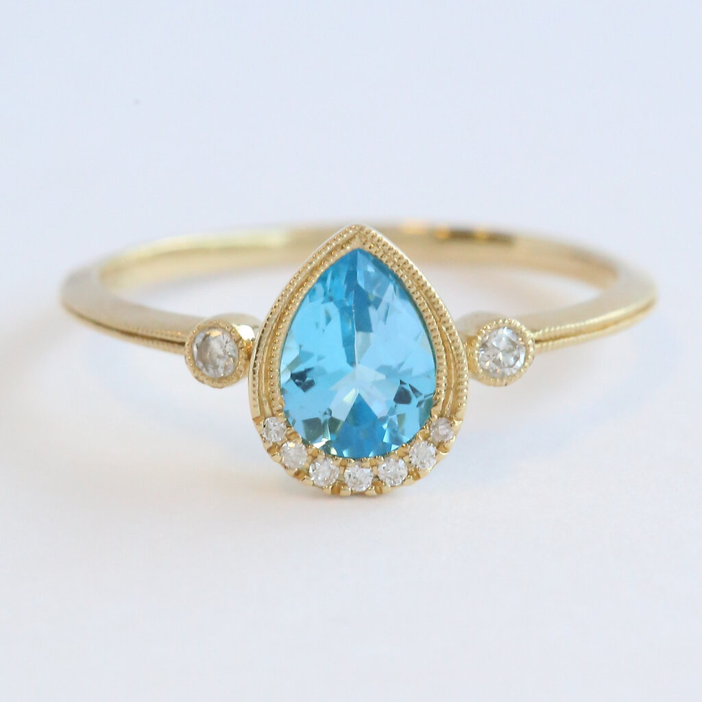 American Jewelry 14k Yellow Gold .80ct Blue Topaz .08ctw Diamond Accent Milgrain Ring (Size 7)
