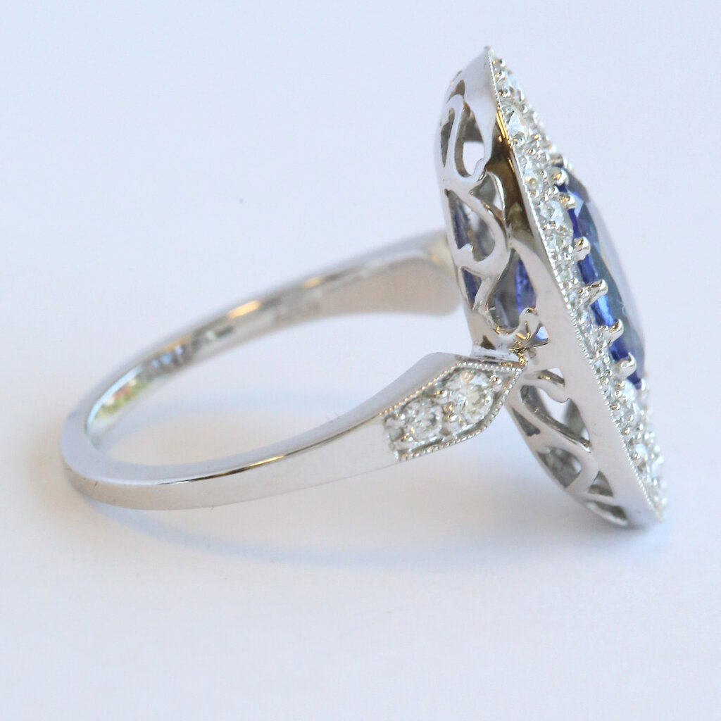 American Jewelry 14k White Gold 2.76ct Tanzanite 1.08ctw Diamond Baguette & Round Oval Halo Ring