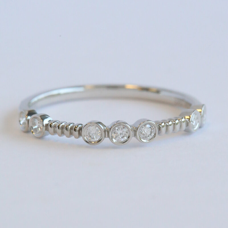 American Jewelry 14k White Gold .12ctw Diamond Bezel Wedding Band