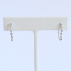 American Jewelry 14k White Gold .51ctw Diamond Oval Hoop Earrings