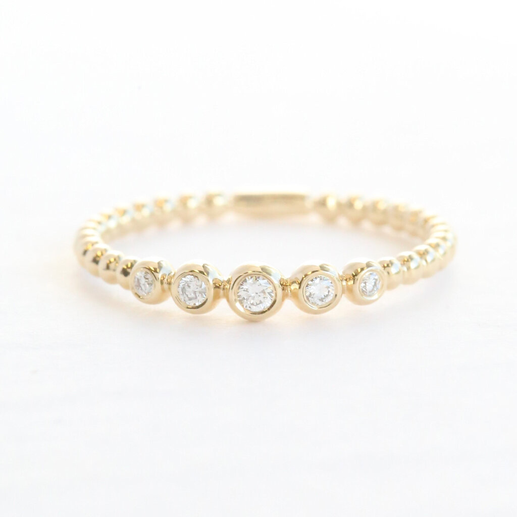 American Jewelry 14k Yellow Gold .08ctw Graduated Diamond Bezel Beaded Wedding Band