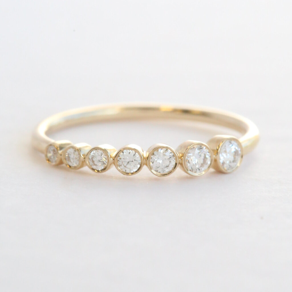 American Jewelry 14k Yellow Gold .25ctw Diamond Ascending Bezel Wedding Band