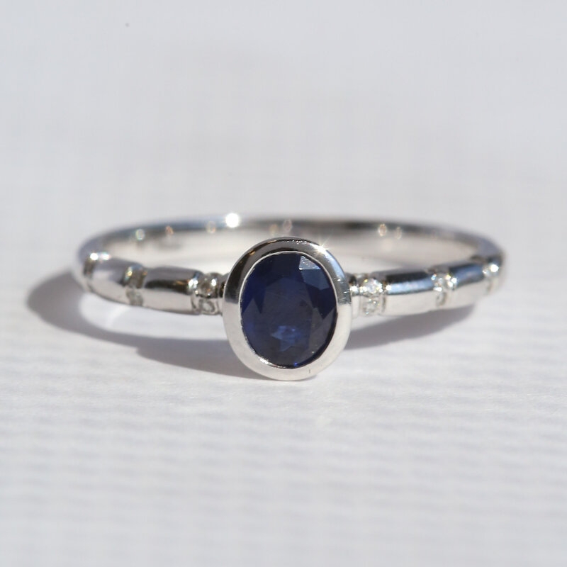 American Jewelry 14k White Gold .50ctw Sapphire .07ctw Diamond Bezel Oval Ring