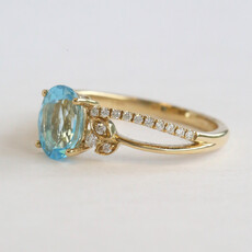 American Jewelry 14k Yellow Gold 1.55ct Blue Topaz .15ctw Diamond Oval Ring