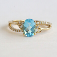 American Jewelry 14k Yellow Gold 1.55ct Blue Topaz .15ctw Diamond Oval Ring
