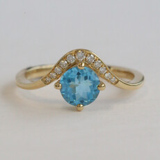 American Jewelry 14k Yellow Gold 1.07ct Blue Topaz .09ctw Diamond Wave Bypass Ring