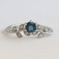 American Jewelry 14k White Gold .46ct London Blue Topaz .07ctw Diamond Milgrain Leaf Design Ring