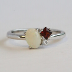 American Jewelry 14k White Gold .50ct Opal, .18ct Garnet, .04ct Diamond Ring